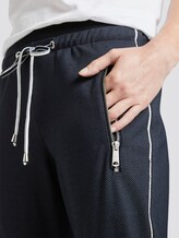 Loose-fit trousers with zippers - Women - navy small dot design Loose-fit trousers with zippers - Women - navy small dot design - 9 - TOM TAILOR