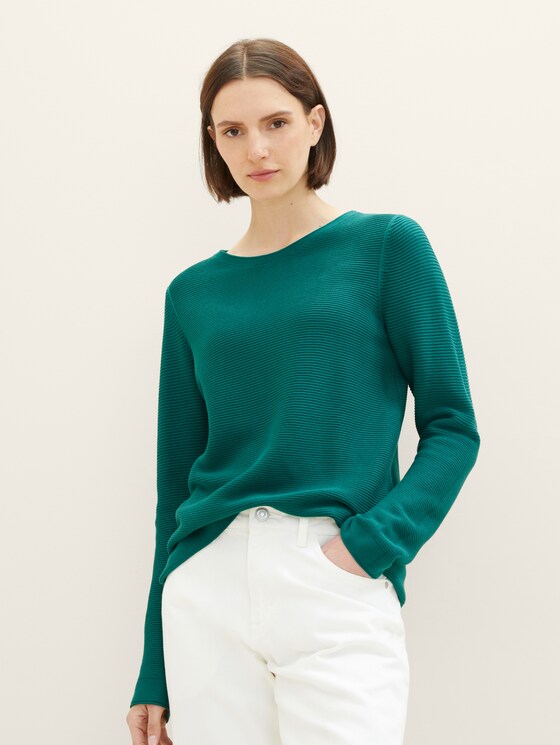 Knitted sweater with a round neckline