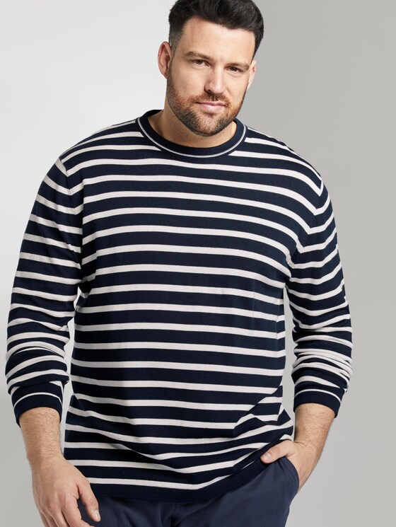navy blue sweater with white stripes