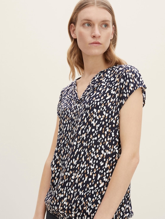 patterned blouse with a turn-down collar