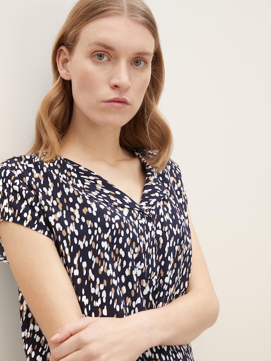 patterned blouse with a turn-down collar