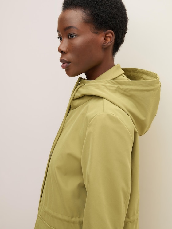 Regular fit parka with side slits with a zip
