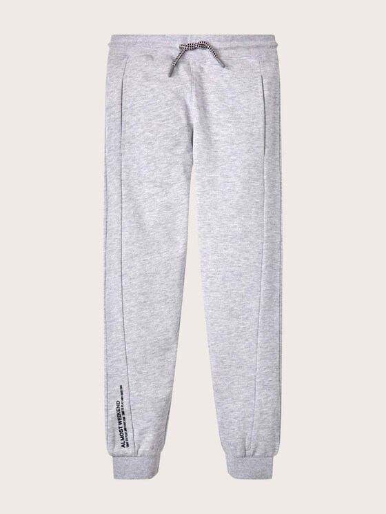 Jogging bottoms with printed lettering on the side