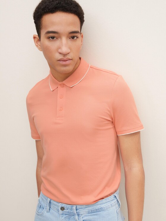 peach color polo shirt