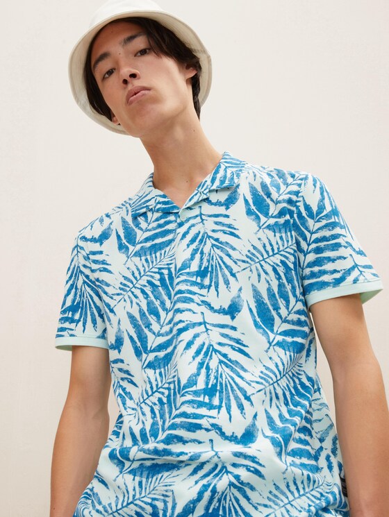Polo shirt with a palm tree print