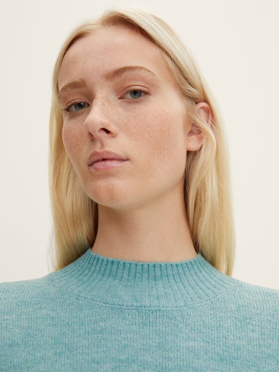 Knitted jumper with a stand-up collar