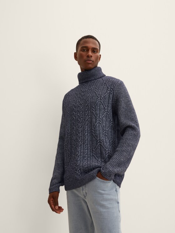 Turtleneck sweater with a cable knit pattern