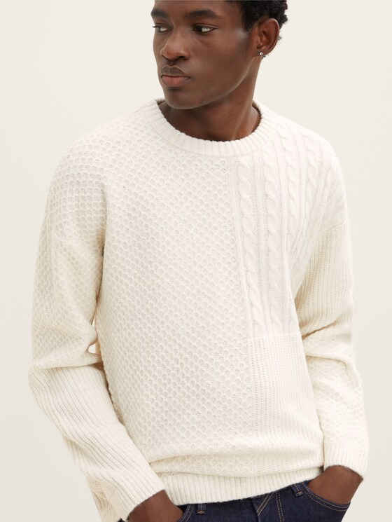 Knitted sweaters with different textures