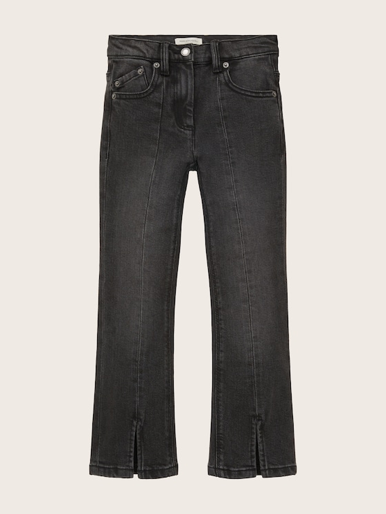 Elastic jeans with a trouser leg slit