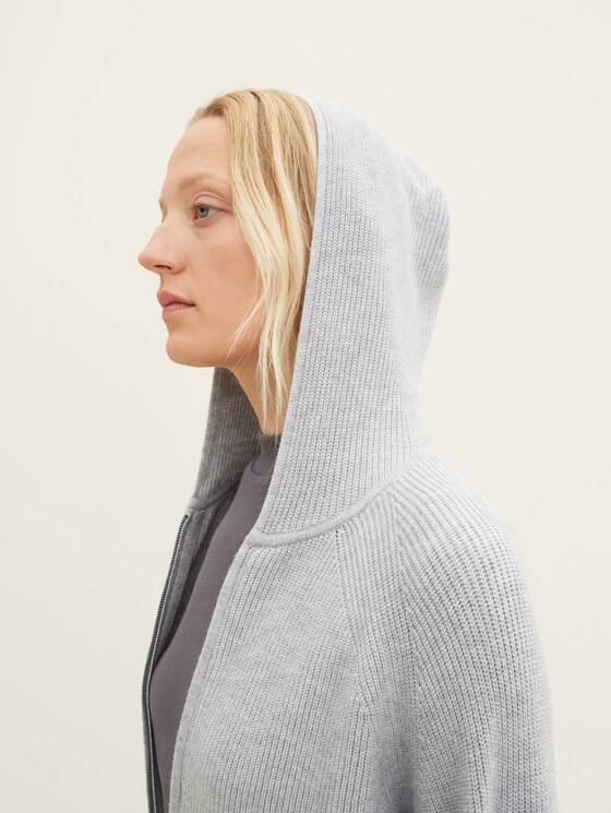 Knitted jacket with a hood