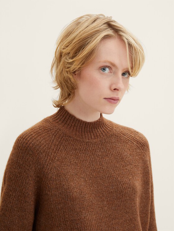 Knitted jumper with a stand-up collar