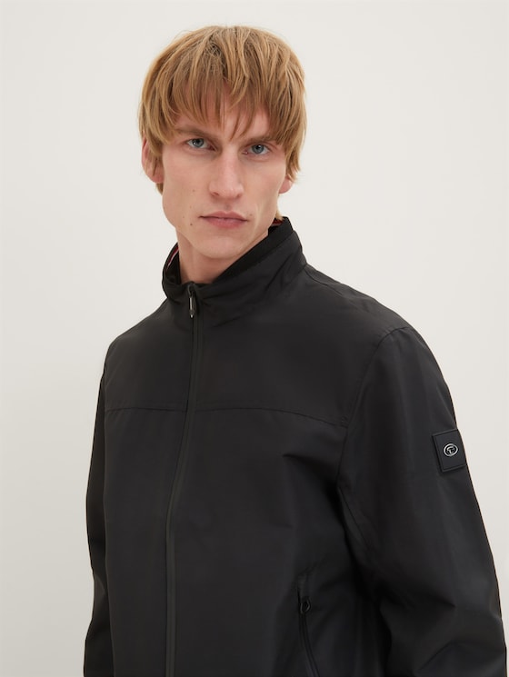 Jacket with a stand-up collar