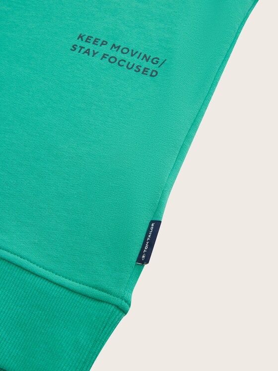 Sweatshirt with a text print