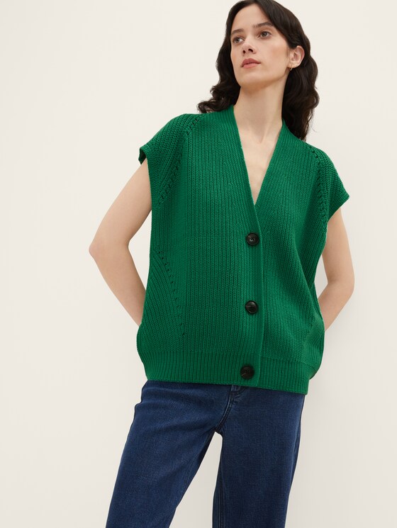Sweater with a button tab