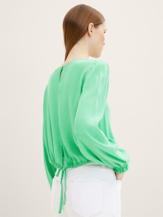Blouse with a back slit