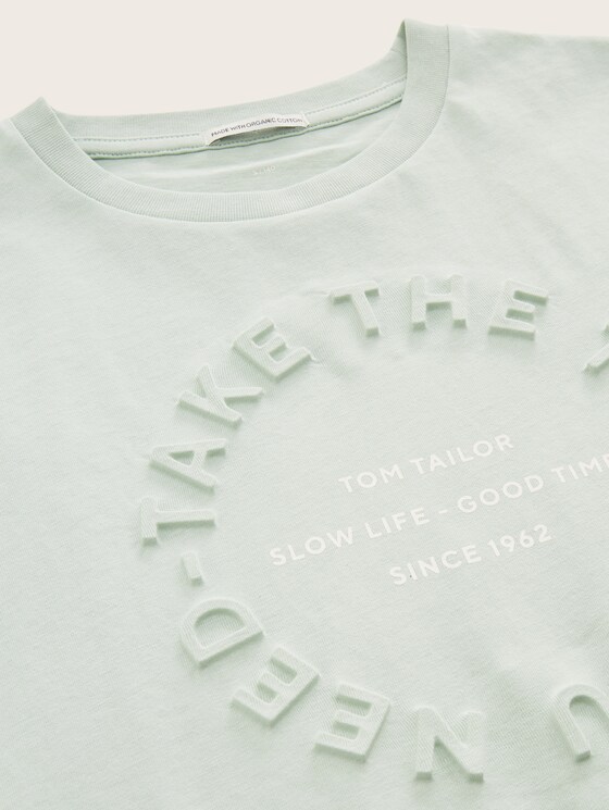 T-shirt with embossed text