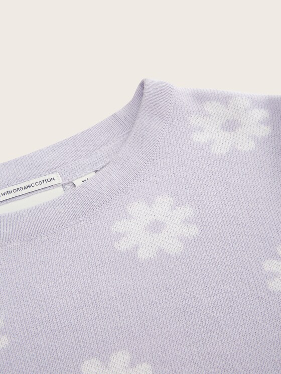 Knitted sweater with a floral pattern