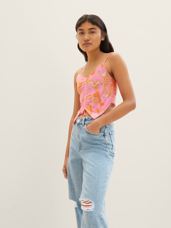 Patterned mesh top