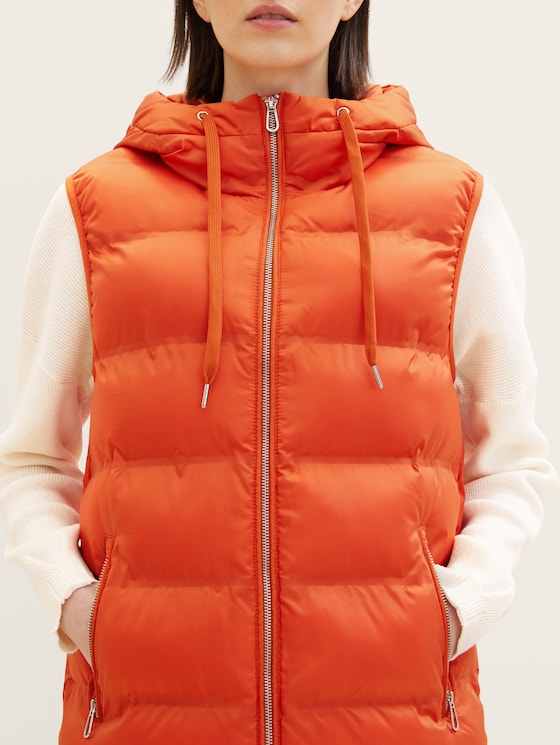 Long lightweight vest with a hood
