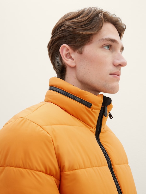 Quilted jacket with a stand-up collar