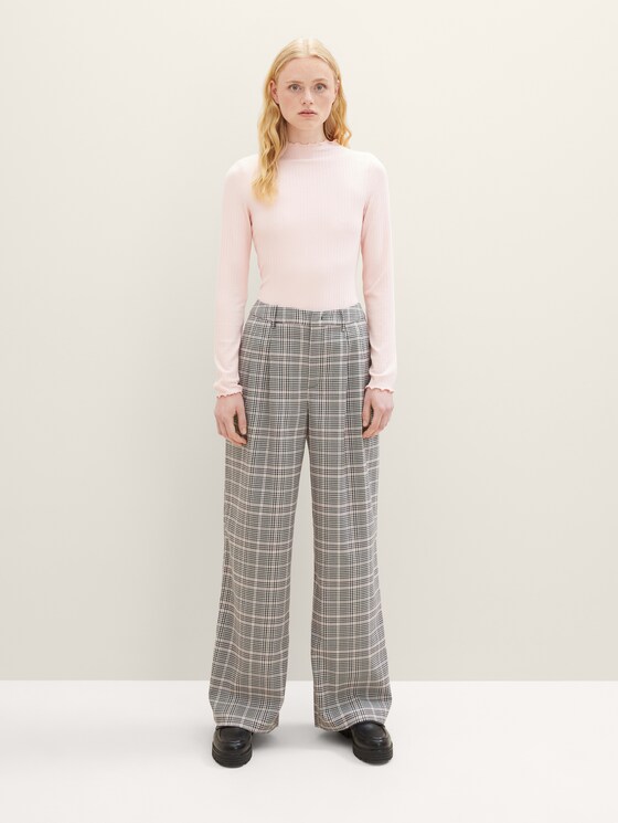 Trousers with a check pattern