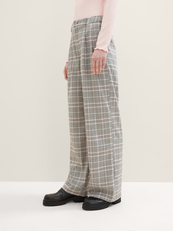 Trousers with a check pattern