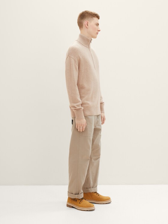 Knitted sweater with a relaxed troyer