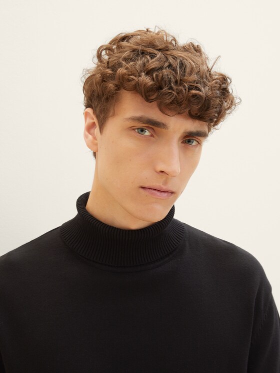 Knitted pullover with a turtleneck