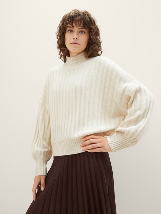 Knitted sweater with a ribbed texture