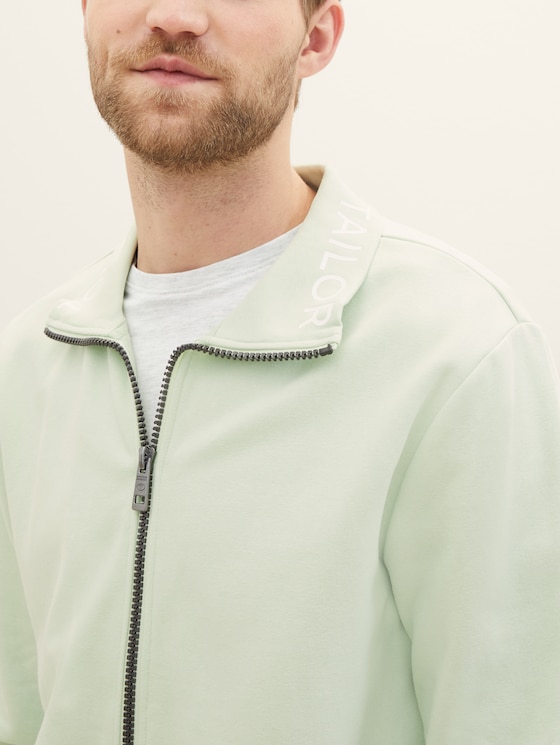Sweatjacket with a stand-up collar