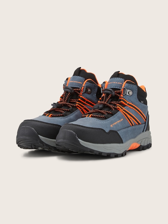 Trekking shoes with applications