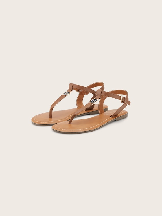 Flat sandals made of artificial leather