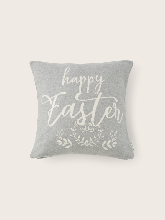 Knitted decorative cushion cover with lettering