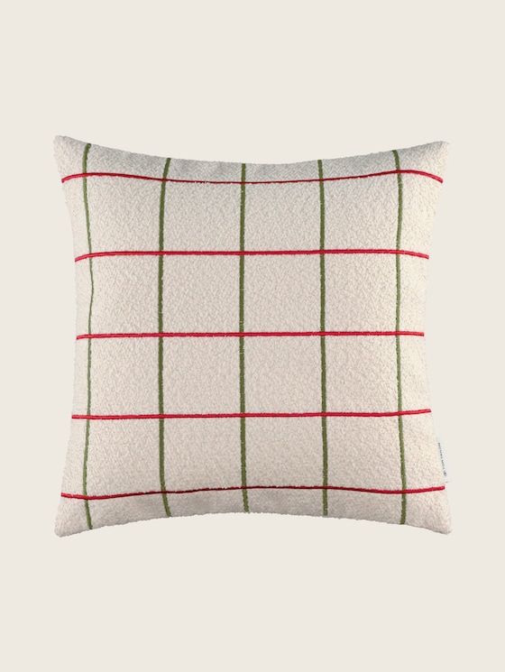 Woven cushion cover in a check pattern