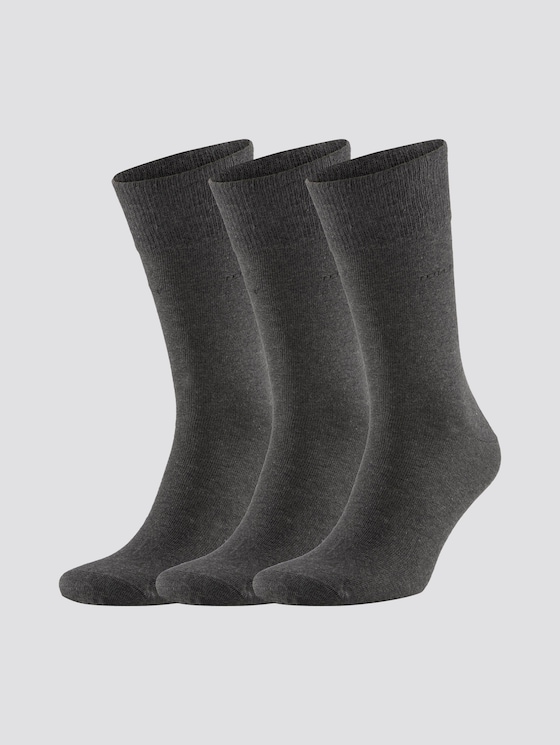 Effen gekleurde sokken in een verpakking van drie