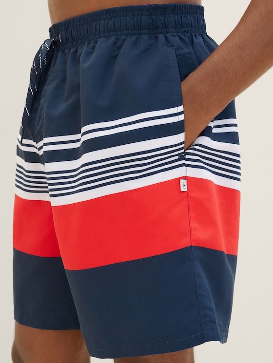 Swimming trunks in a striped pattern