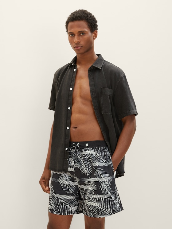 Patterned swimming shorts
