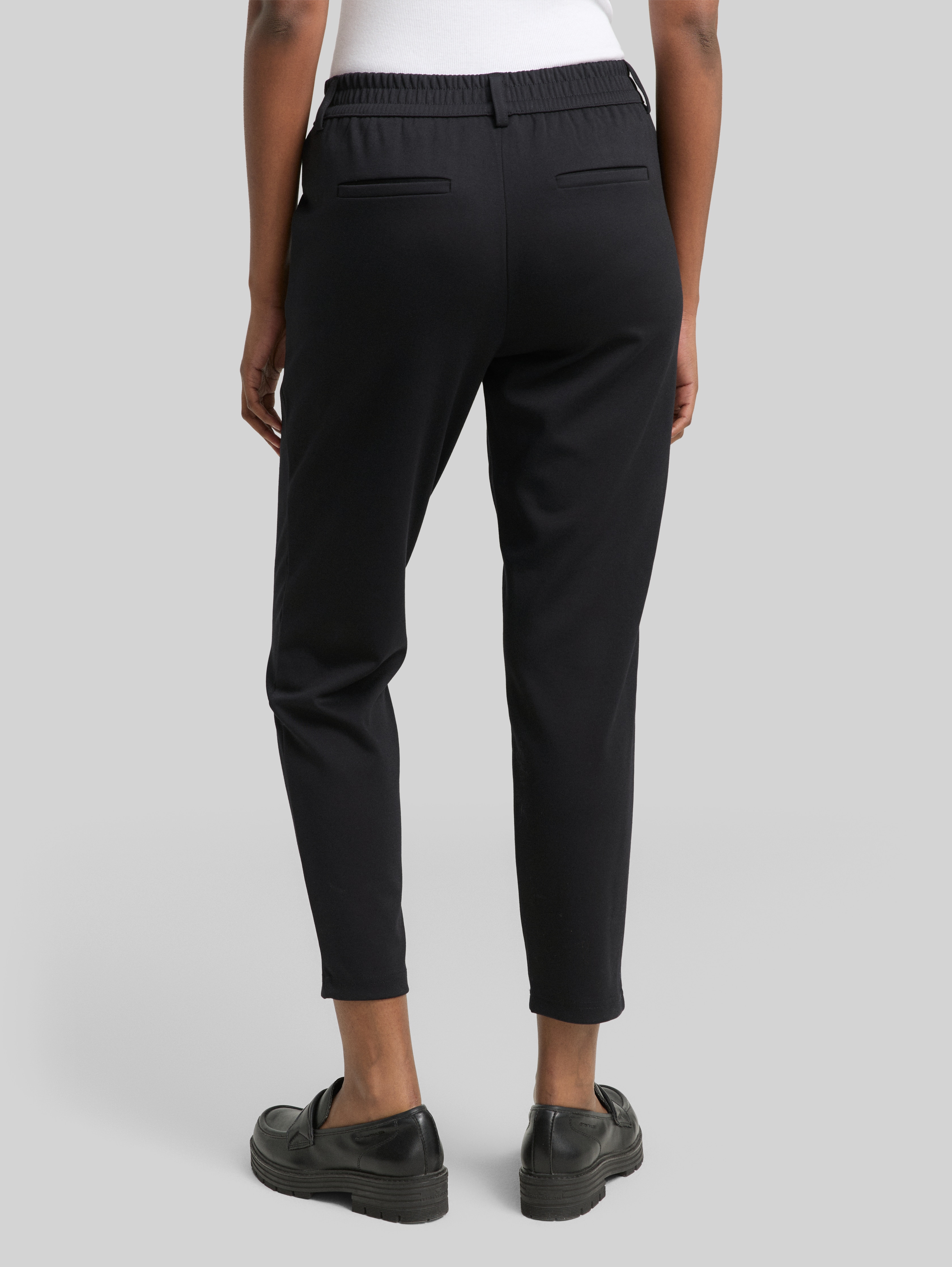 Relaxed-fit trousers with elasticated waistband in black by Tom Tailor