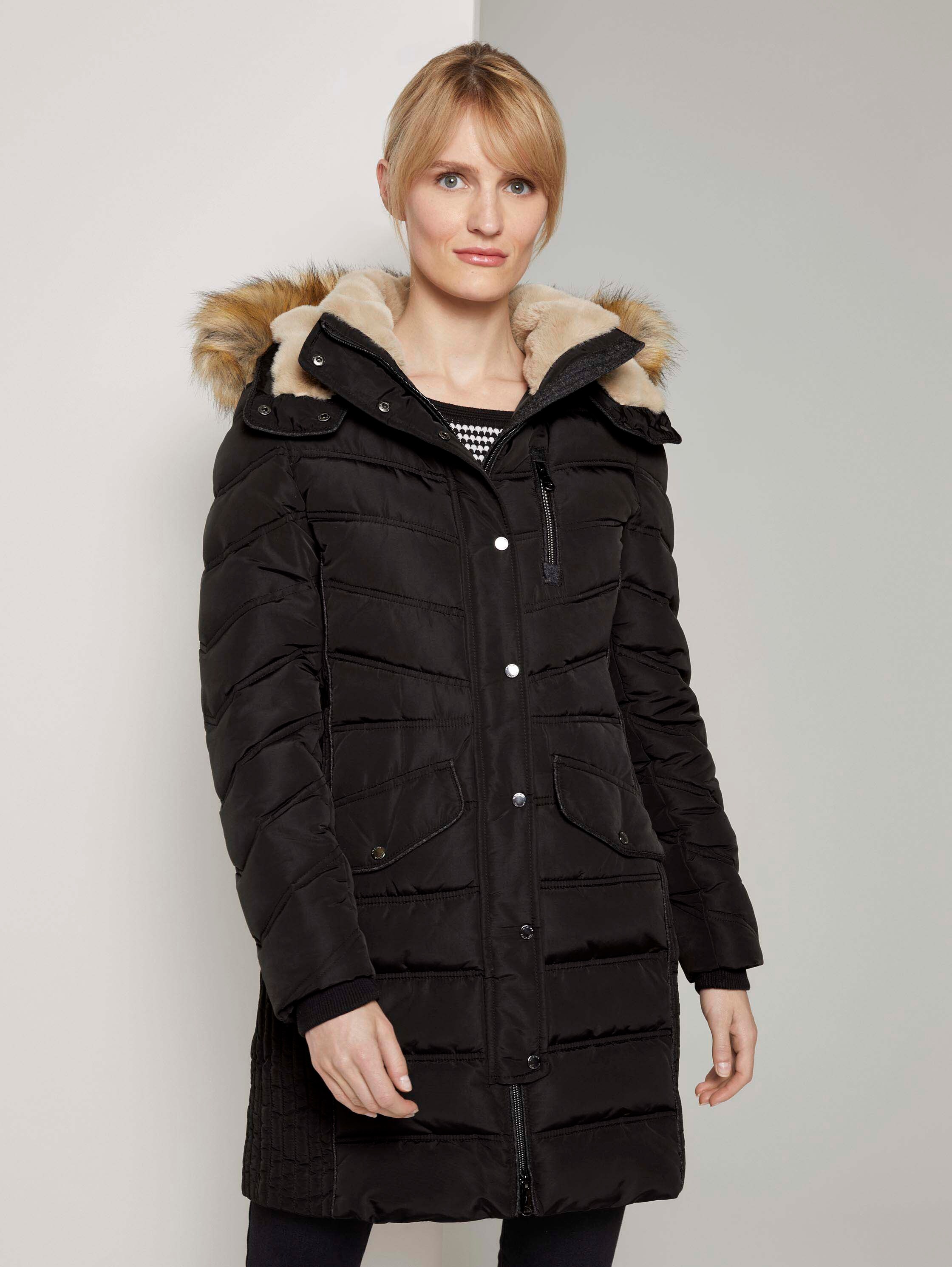 Puffer coat with a fur hood - deep black - Model front view