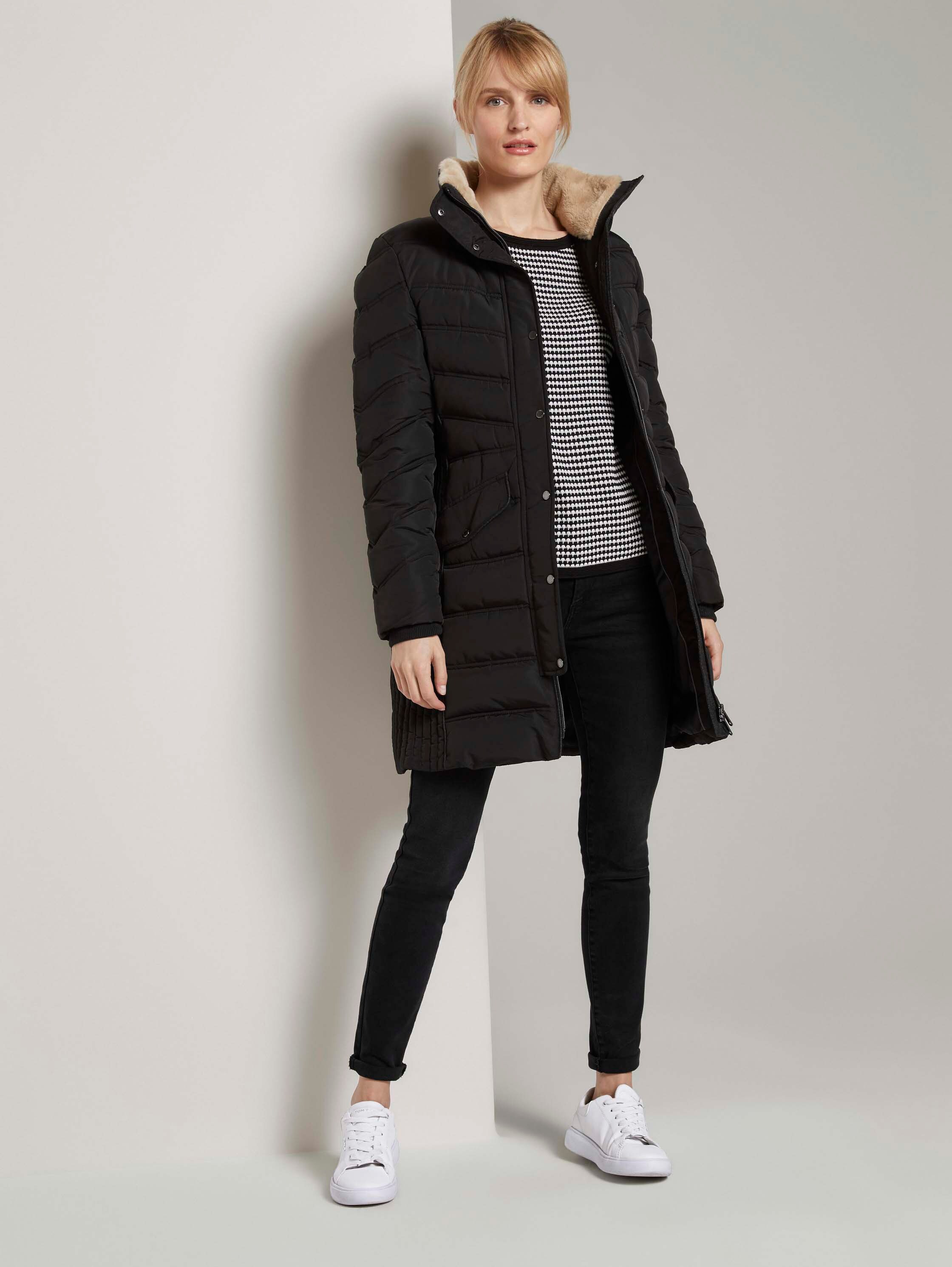 Puffer coat with a fur hood - deep black - side model view