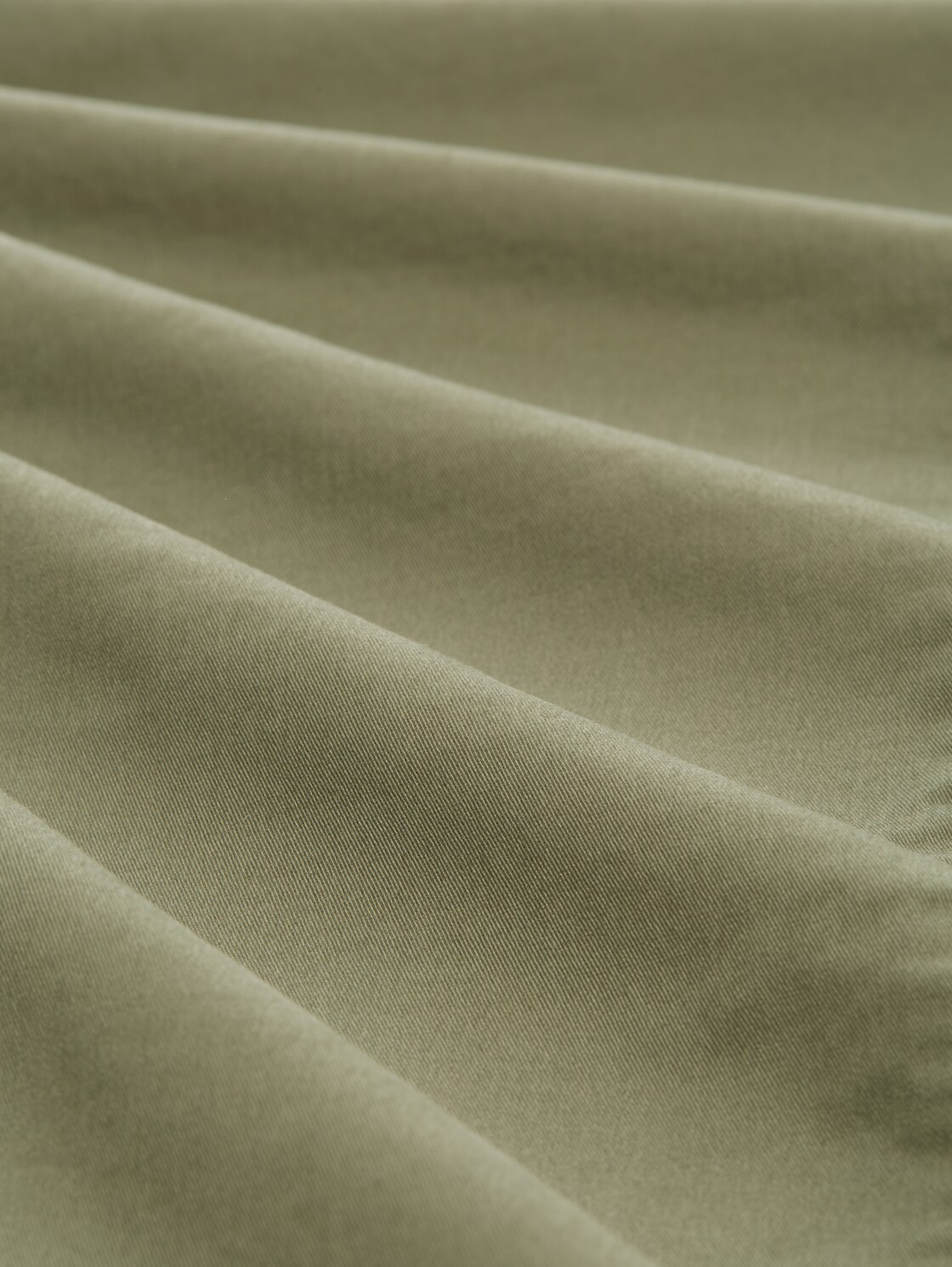 Slim Chino Hose mit Gürtel - tree moss green - Material-Ansicht