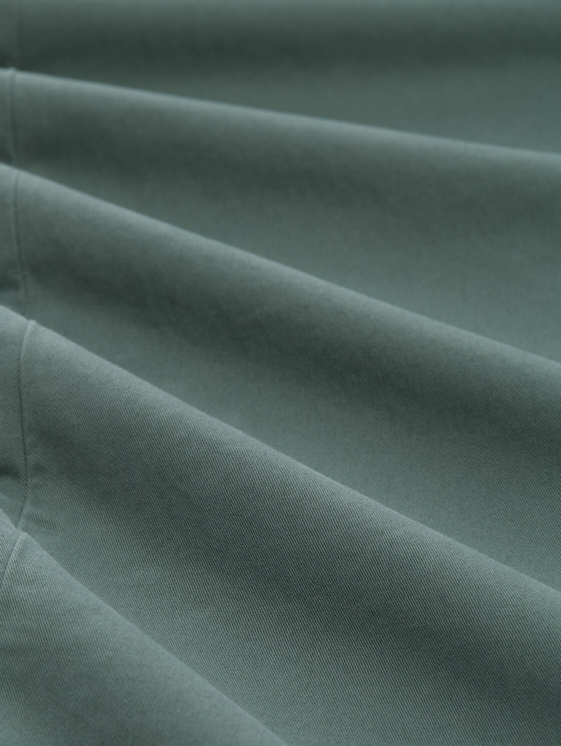 Slim Chino Hose mit Gürtel - washed jasper green - Material-Ansicht