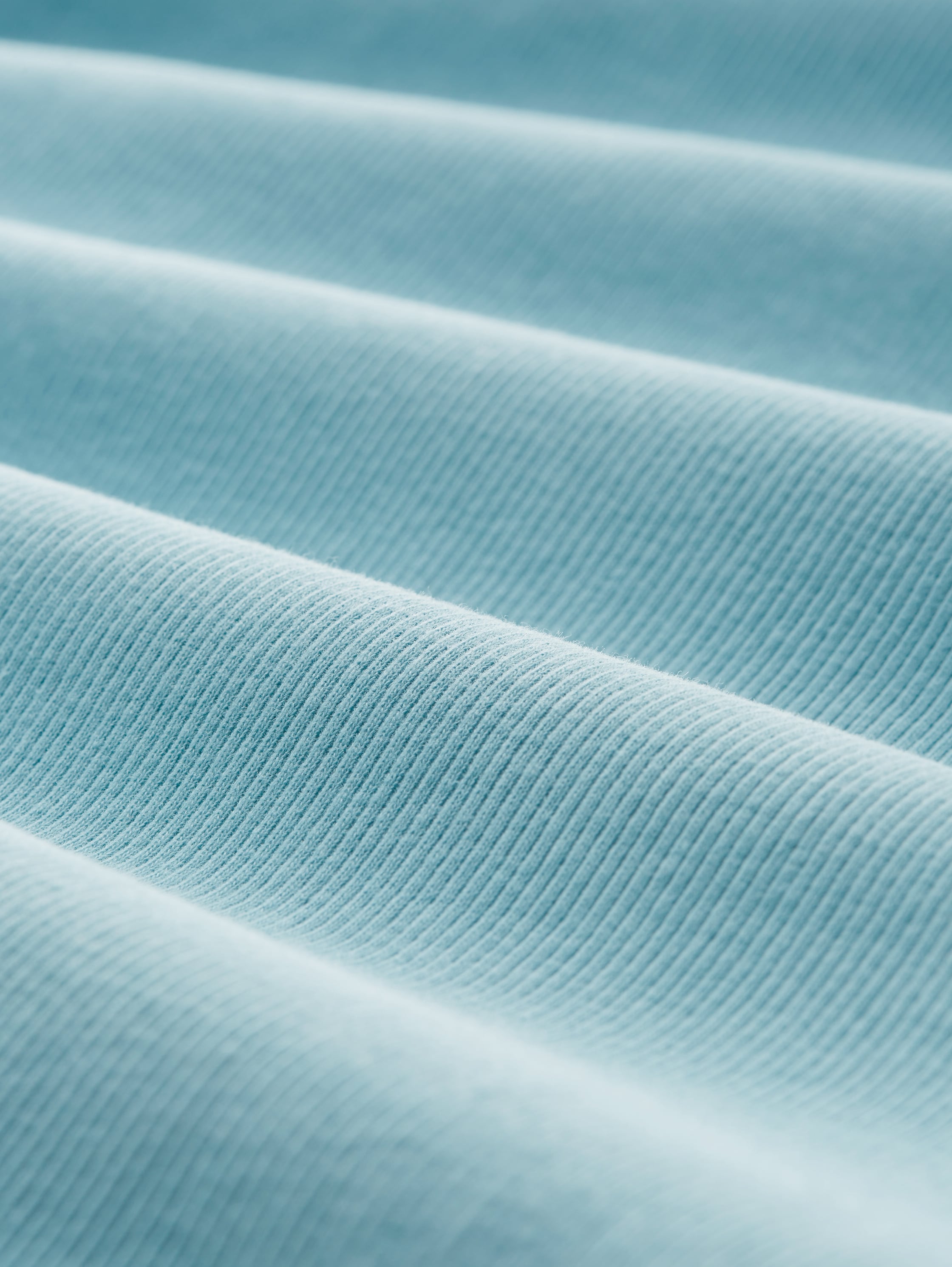 Gebreide coltrui - bright reef blue - Materiaalweergave