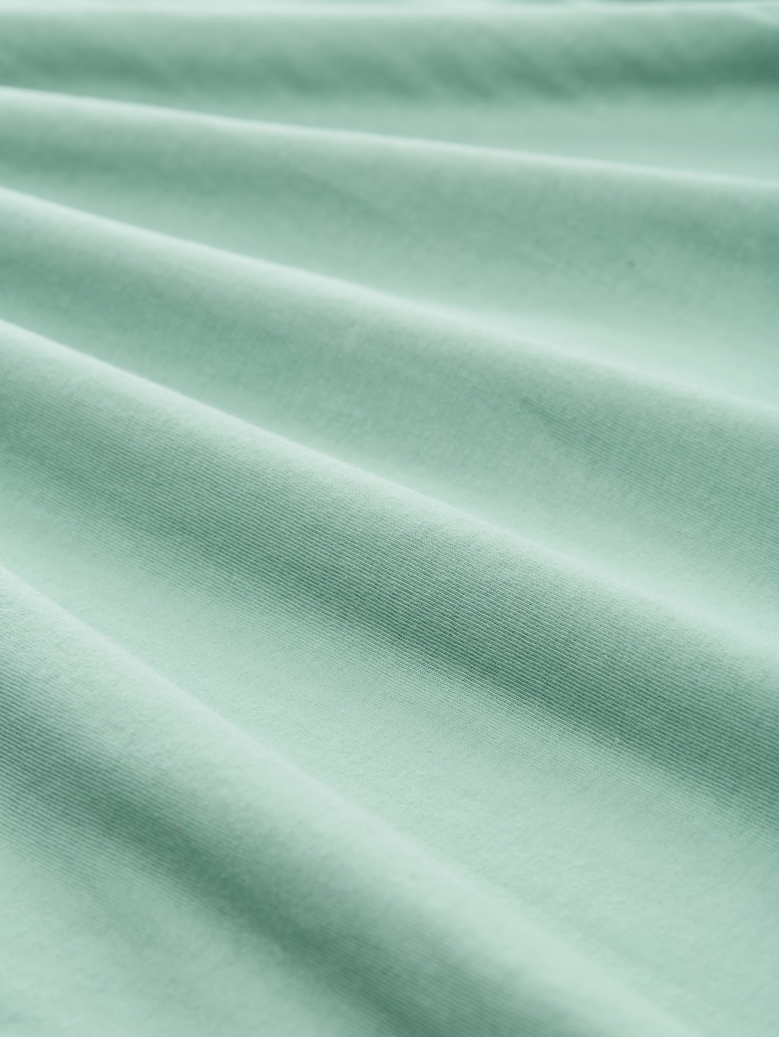 T-Shirt mit Logo-Print - dust green - Material-Ansicht