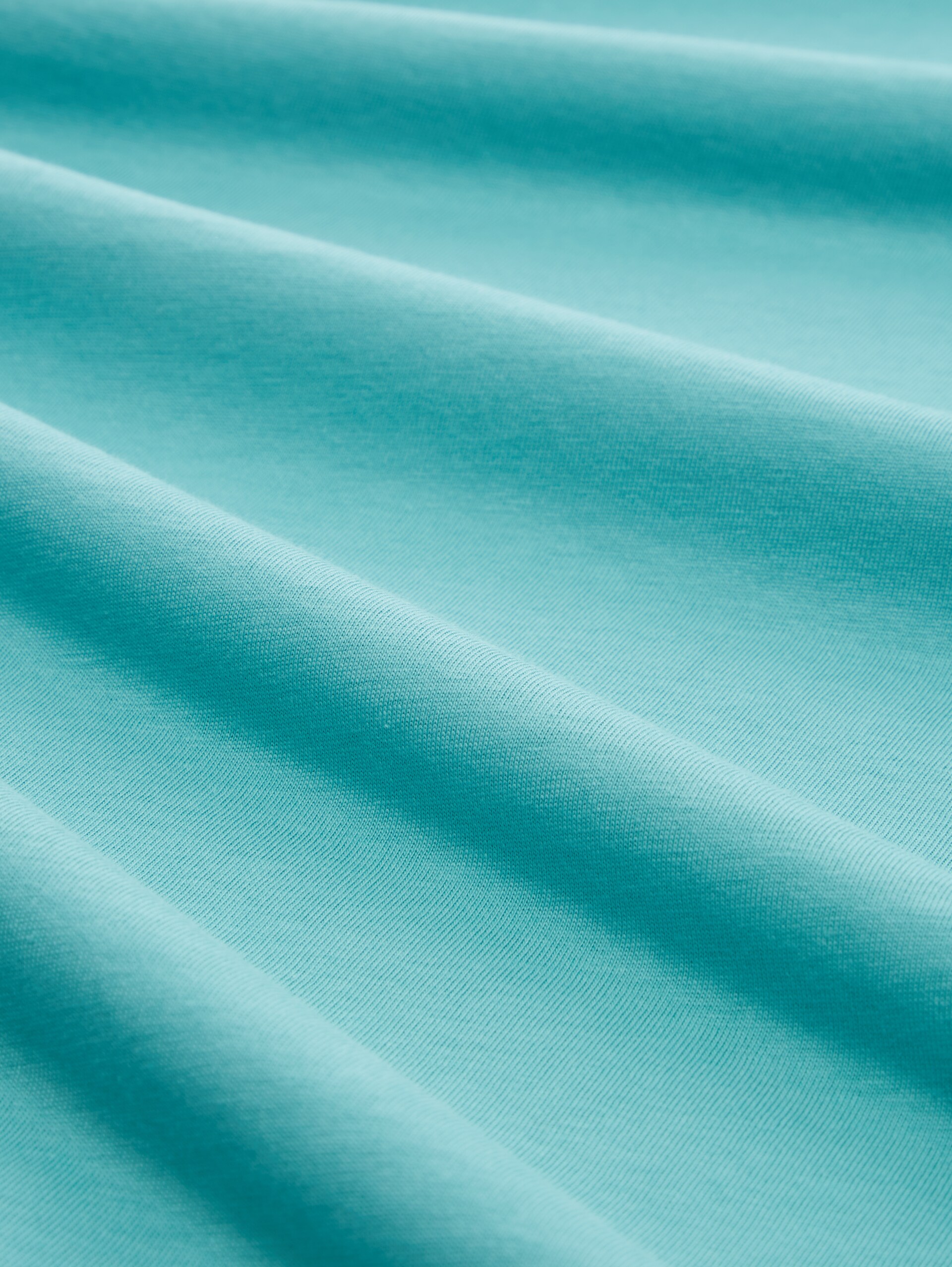 T-shirt met logoprint - meadow teal - Materiaalweergave