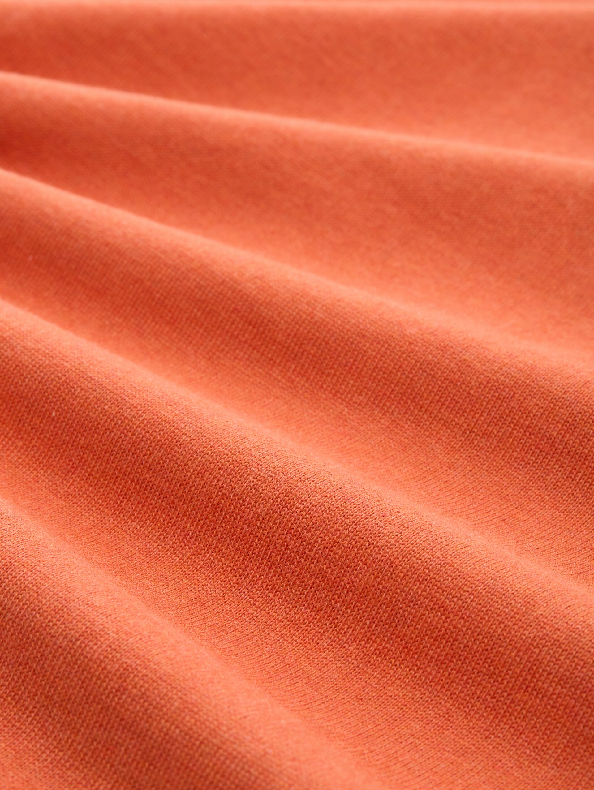 Basic knitted jumper in cotton - chili orange melange - Material view