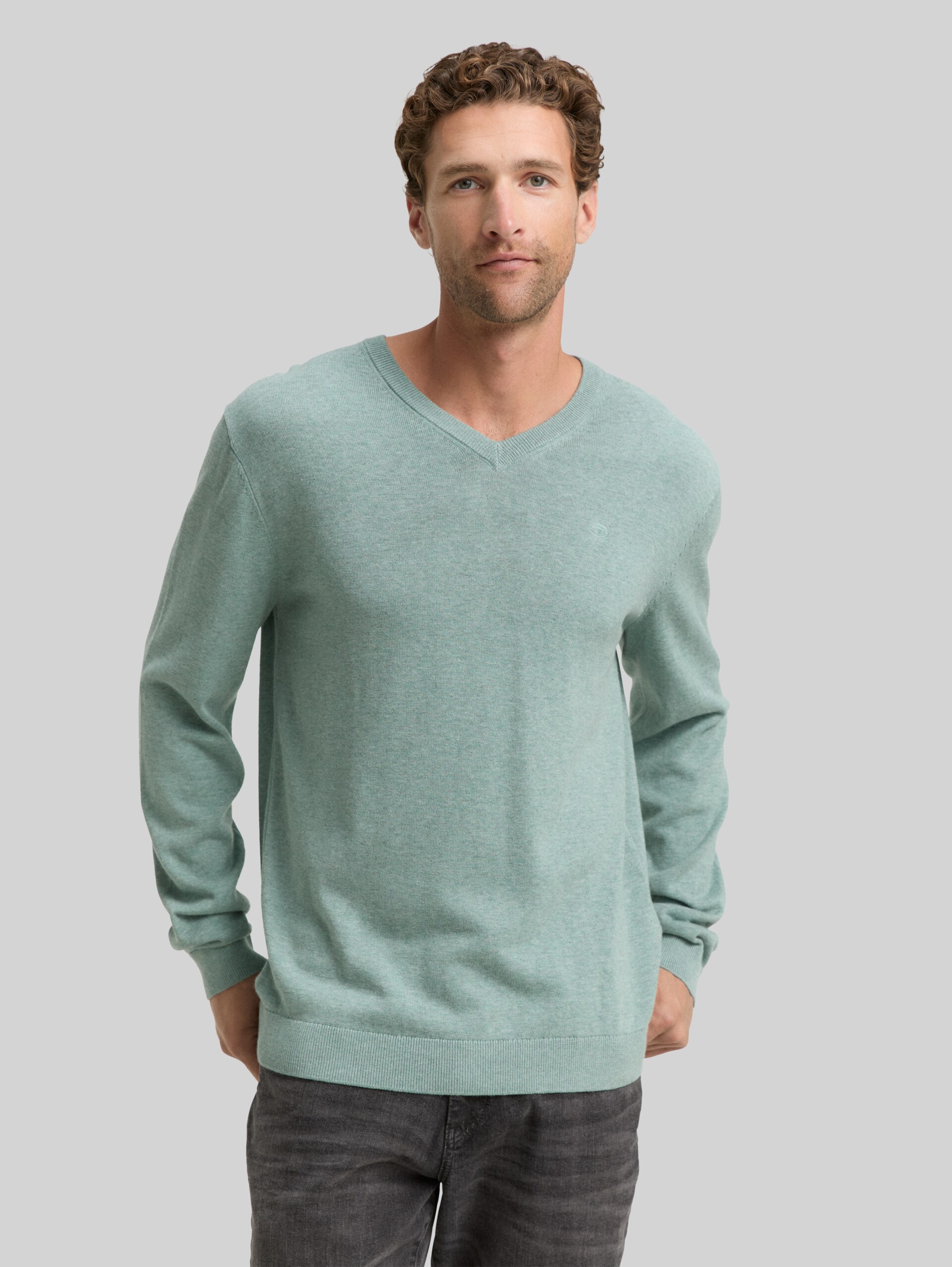 Cotton knit jumper with V-neck - dark smoke green melange - Neckline model front view