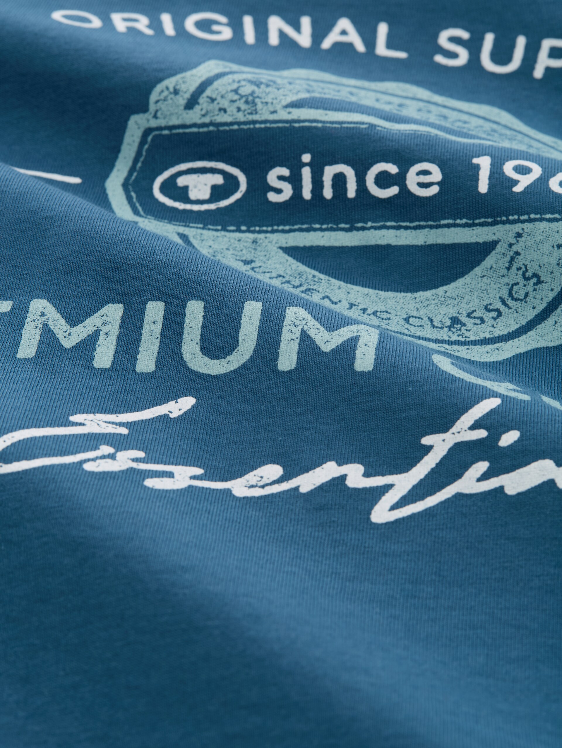 Plus Size - T-Shirt mit Logo Print - real teal blue - Material-Ansicht