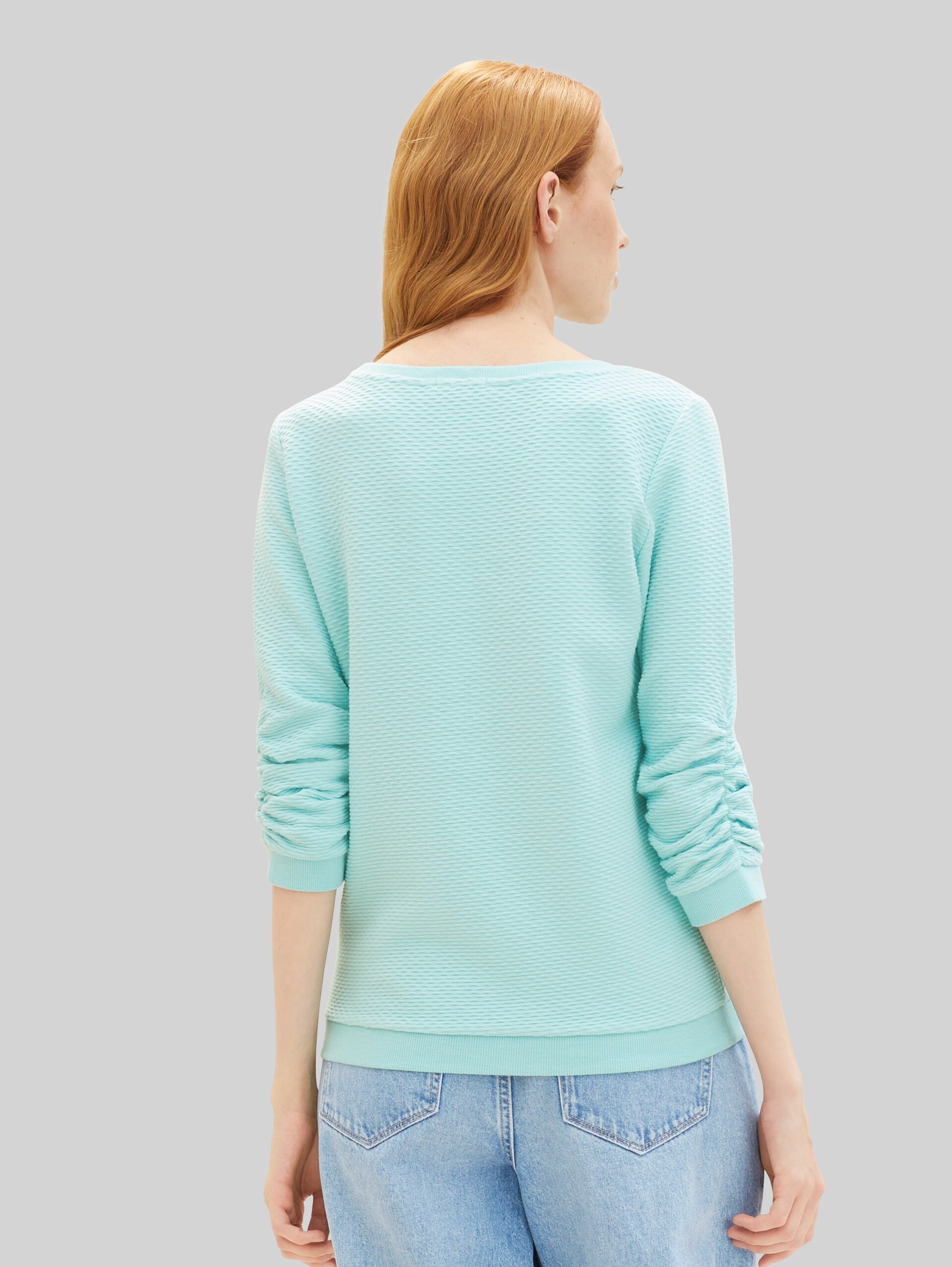 Sweatshirt with ruffles - pastel turquoise - Neckline model-back view