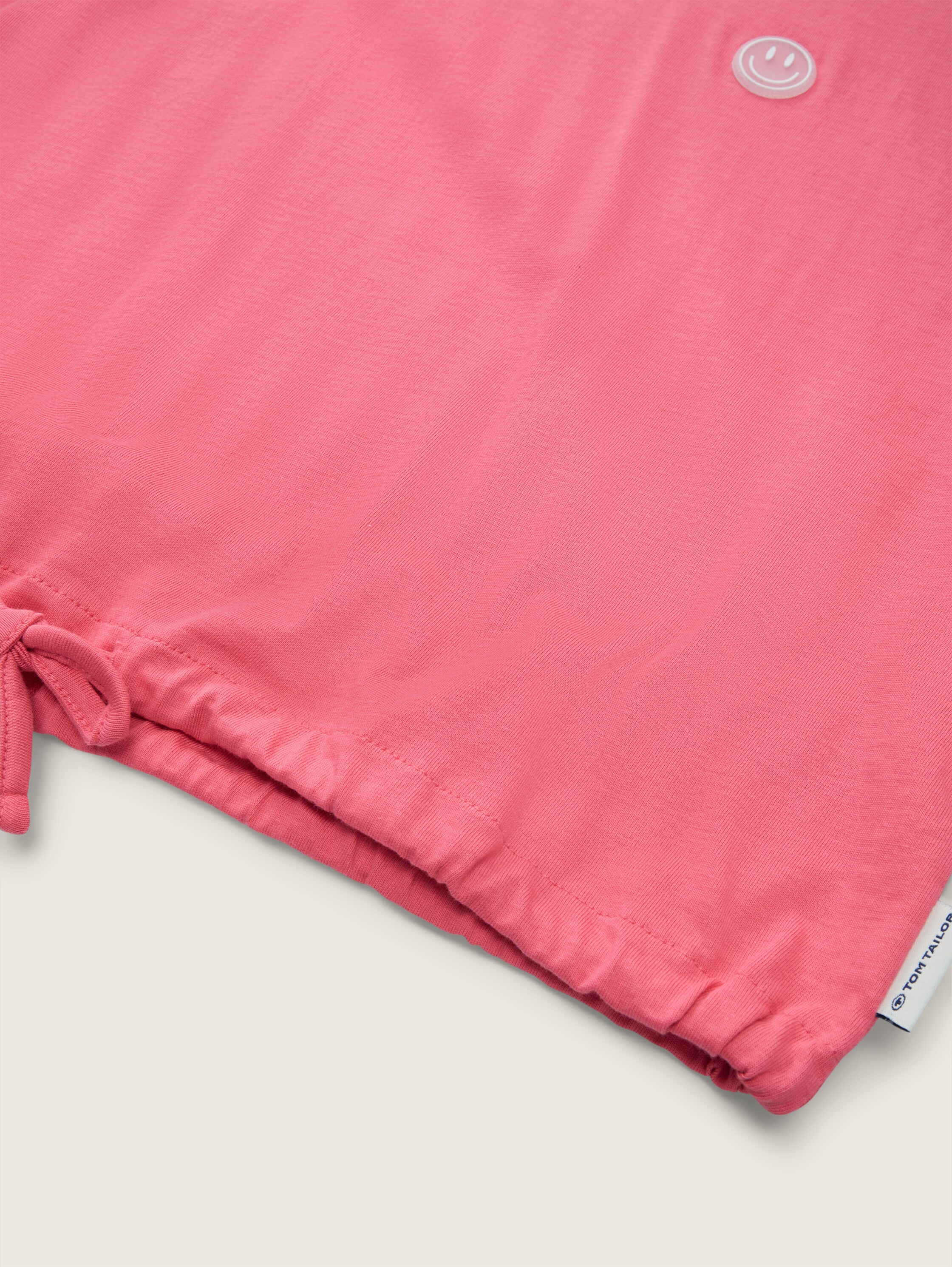 T-shirt met organische katoen - dull pink - Detailaanzicht model